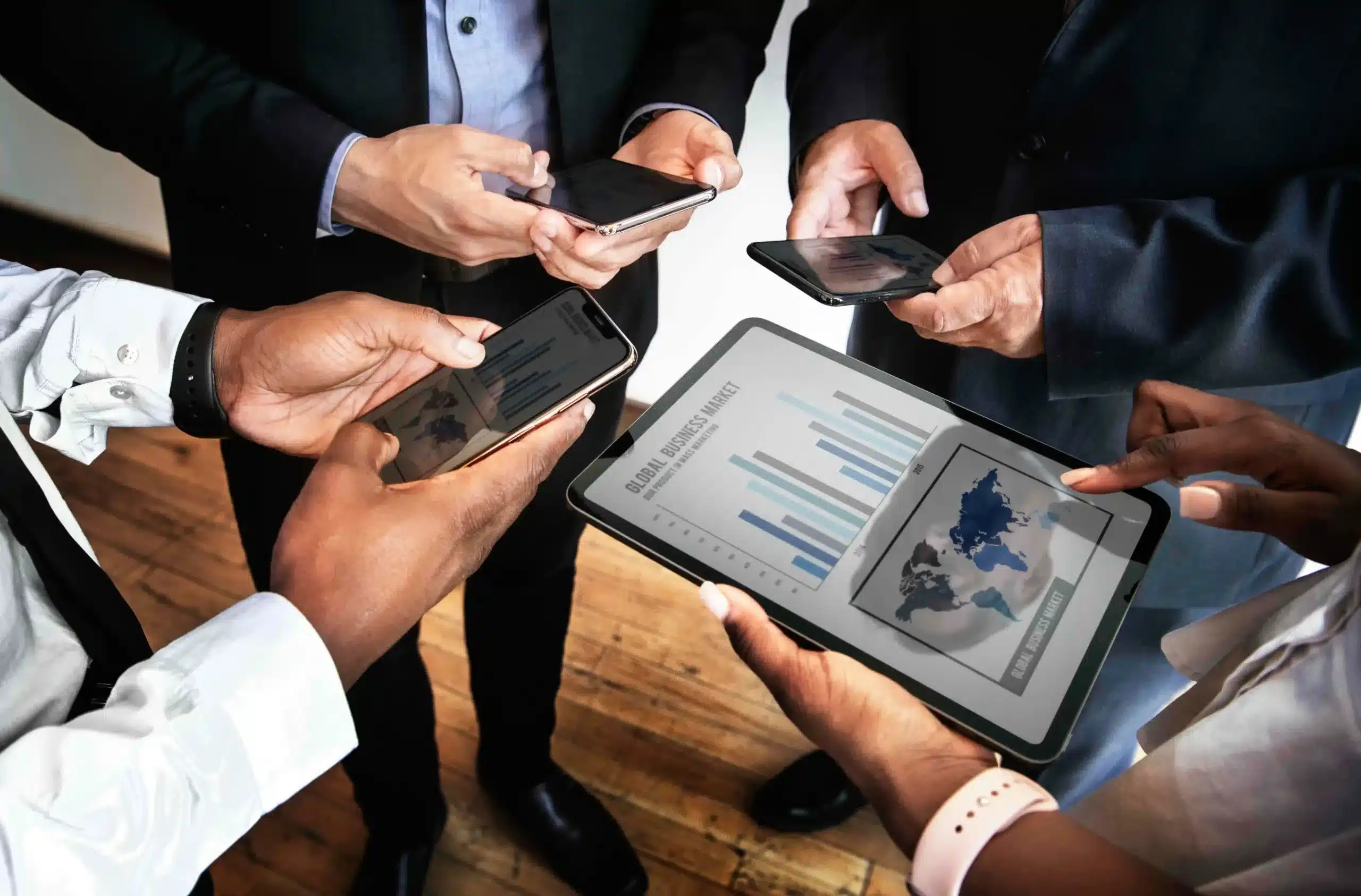 A Group of People Holding Tablets in Hand